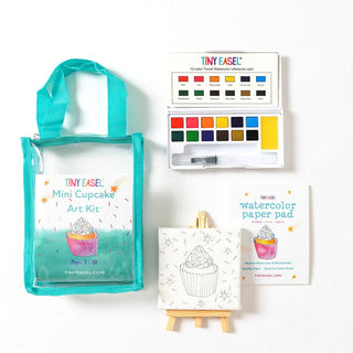 Tiny Easel Mini Art Kit - Cupcake
Art kit with watercolor paper pad, color swatches, and tote bag on a white background