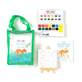 Tiny Easel Mini Art Kit - Dinosaur
Art supplies including a green tote bag, color chart, watercolor paper pad, and mini easel on a white background.
