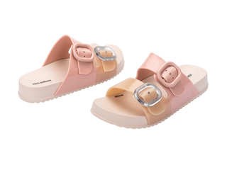 Mini Melissa Cozy Slide Kids - Pink / Beige
Pair of pink sandals with silver buckles on a white background