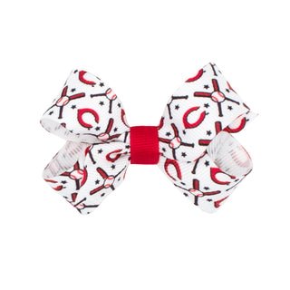 Mini Cincinnati Reds hair bow by Wee Ones on a clippie featuring red and white team colors and baseball-themed design.