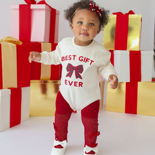 Sweet Wink Christmas long sleeve romper with "Best Gift Ever" patch, featuring shimmer red velvet, bow tights, and a pearl headband.