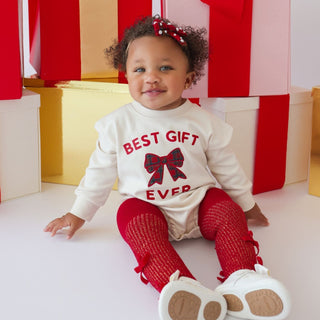 Sweet Wink Christmas long sleeve romper with shiny red velvet bow, pearl headband, and baby tights, perfect for holiday gift.