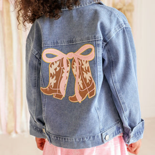 Sweet Wink Cowgirl Cutie Patch Western Denim Jacket
Denim jacket with cowboy boot and bow design on a neutral background
