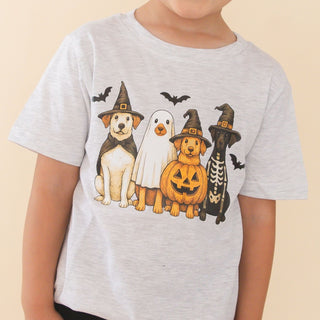 Sweet Wink Halloween Puppies Short Sleeve T-Shirt
A child wearing a light heather gray t-shirt with a colorful graphic of four dogs dressed in Halloween costumes (wizard, ghost, pumpkin, and skeleton).