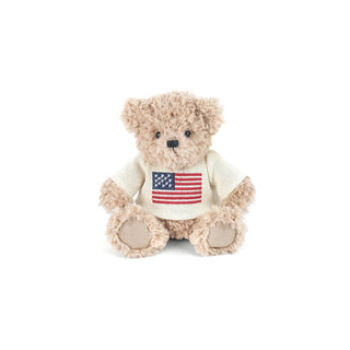 Mon Ami American Teddy Bear - Small
Plush teddy bear wearing a shirt with an American flag on a white background