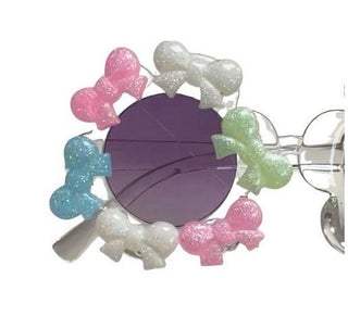 Multi Color Bari Lynn Crystallized Bow Charm Sunglasses
Decorative hair clip with colorful bows on a white background