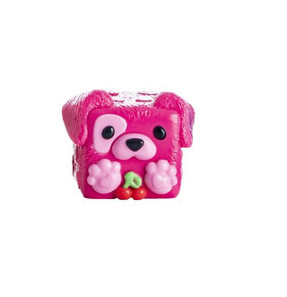 Five cute animal-shaped squishy toys arranged in a row on a plain white background. From left to right, they resemble a brown bear, a pink pig holding a red apple, a green and white cow, a pink dog holding a red apple, and a purple cat holding a pink donut.