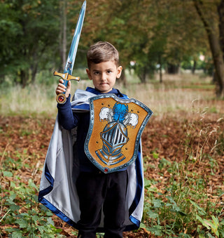 Liontouch Sword - Mystery Knight
Child in a fantasy costume with a sword and shield in a forest setting