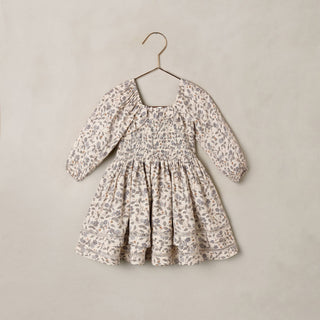 Noralee Elodie Dress - Blue Garden
Floral dress on a hanger against a plain background
