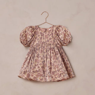 Noralee Luna Dress - Harvest Fleur
Floral dress with puff sleeves on a beige hanger against a beige background