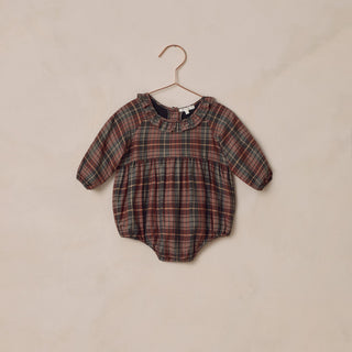 Noralee Adeline Romper - Winter Tartan
Plaid baby romper on a beige background