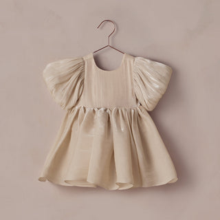Noralee Sofia Dress - Ecru
Beige dress with puff sleeves on a hanger against a beige background