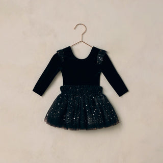 Noralee Lottie Tutu Set - Night Sky
Black dress with sequin details on a beige background