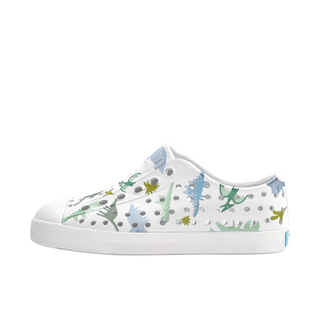Native Jefferson Print Shoes - Shell White / Flux Alpine Dine White sneaker with colorful dinosaur pattern on a white background