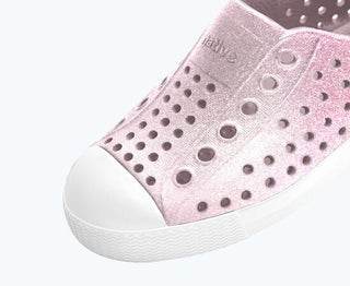Native Jefferson Bio-Bling™ - Barely Samba Bling / Shell White
Pink slip-on shoe with white sole on a light gray background