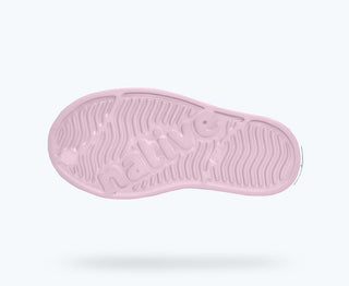 Native Jefferson Print Shoes - Barely Pink / Shell White / Cowgirl
Pink sole of a shoe with visible brand logo on a white background
