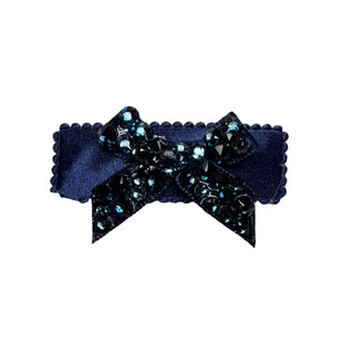 Navy Blue Bari Lynn Small Crystalized Bow on Satin Snap Clip
Navy blue hair bow with decorative elements on a white background