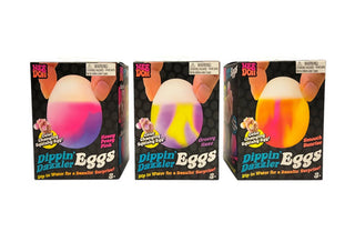 NeeDoh Dippin Dazzler
Three boxes of Dippin' Dazzler Eggs with colorful egg-shaped objects on a white background.