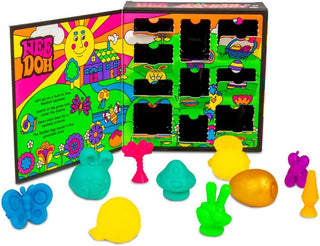 Colorful toy set with packaging featuring the brand 'Nee Doh'.