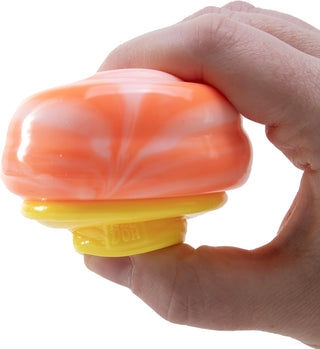 NeeDoh Nice Cream Cone
Hand holding a pink and yellow marbled stress ball against a white background