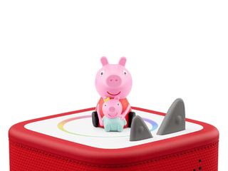 Tonies Character - Peppa Pig: The New Baby Sister
Pink toy pig figure on a red toy boat with shark fin design