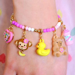 Gold Monkey Charm from Charm It!, a playful jewelry charm featuring a detailed monkey design on a spring-themed bracelet.