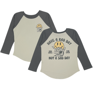 Tiny Whales No Sad Days L/S Raglan - Cinder / Vintage Black
Long-sleeve shirt with graphic design and text on a white background