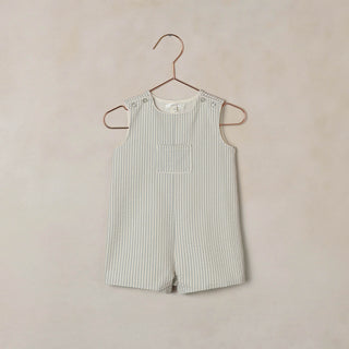 Noralee Georgie Romper - Sky Stripe
Striped romper on a hanger against a beige background