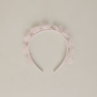 Noralee blush pixie headband with delicate design, perfect for adding a soft, romantic touch to your hairstyle.