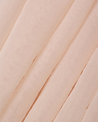 Noralee Sofia Dress - Blush
Close-up of pleated fabric with a soft pink color.