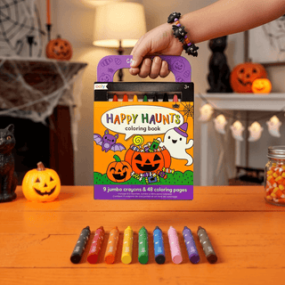 Ooly Carry-Along! Happy Haunts coloring book and crayon set with 10 crayons contents displayed