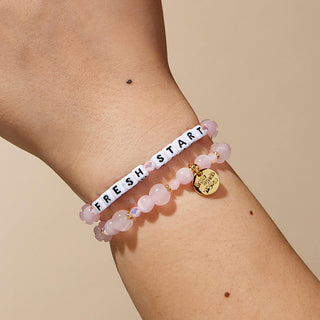 Little Words Project Bracelet - Fresh Start
Bracelet with 'FRESH START' on a wrist against a beige background