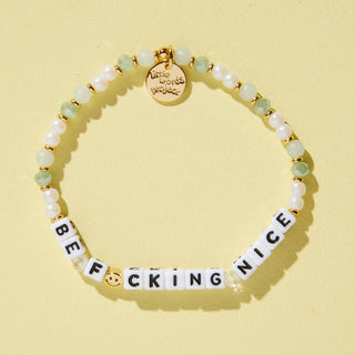 Little Words Project Bracelet - Be F*cking Nice
Bracelet with letter beads spelling 'BE F*CKING NICE' on a yellow background