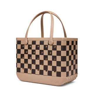 Original Bogg® Bag - Checkered: Camel / Hot Cocoa
A structured tote bag with a beige and dark brown checkerboard pattern, featuring a solid beige base, dual top handles, and small metallic studs on the front, shown on a plain white background.