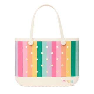 Original Bogg® Bag - Liquid Sunshine - Color Burst
Colorful striped tote bag with polka dots and 'bogg' branding on a white background