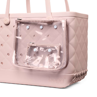 Original Bougie Bogg® Bag - Quilted Rose Petal
Pink quilted handbag with clear front pocket on a white background