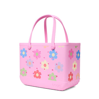 Original Bogg® Bag - Spring Love: Happy Flowers
Pink tote bag with floral patterns on a white background