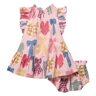 Pink Chicken Baby Girls Harper Dress Set - Patterned Bows
A toddler girl's two-piece outfit featuring a ruffled sleeveless dress and matching bloomers, both in light pink with a colorful pattern of gingham bows and plaid checks in red, blue, yellow, green, and purple.