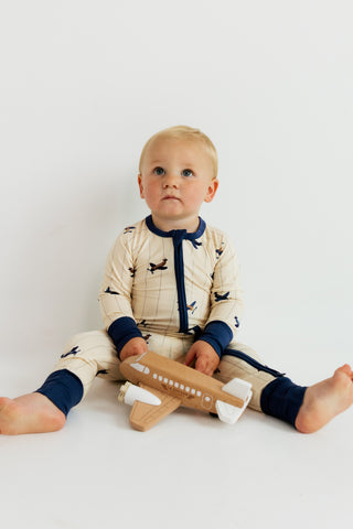 In My Jammers airplane zipper romper pajamas for kids, featuring a playful airplane print and comfortable zipper closure.