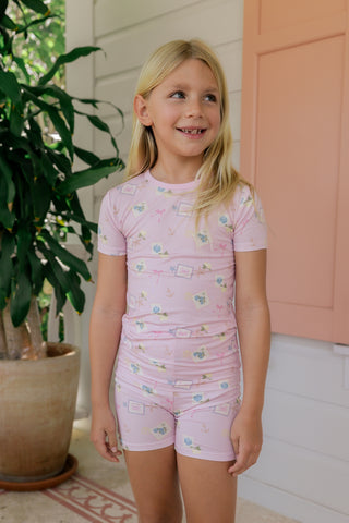 In My Jammers Little Coastal Notes two-piece pajama set with nautical print, featuring a short-sleeve top and shorts in soft fabric.