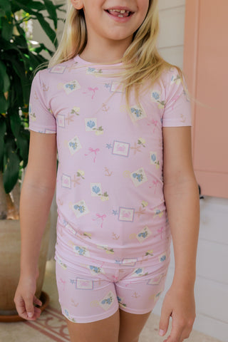 In My Jammers Little Coastal Notes two-piece pajama set featuring a relaxed fit, soft fabric, and coastal-inspired print for comfort.