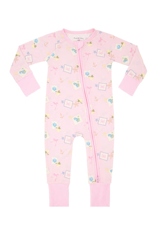 In My Jammers Little Coastal Notes zipper romper pajamas featuring a colorful coastal print and a front zipper detail.