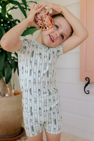 In My Jammers green two-piece pajama set with surf-themed print, featuring short sleeves and shorts for comfortable sleepwear.