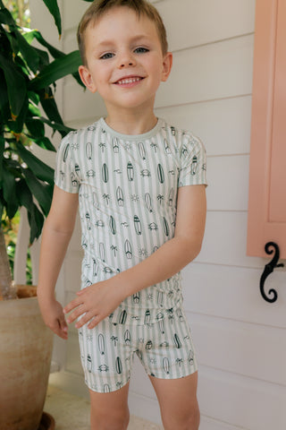 Green In My Jammers two-piece pajama set with surf-themed print, featuring a short-sleeve top and matching shorts.