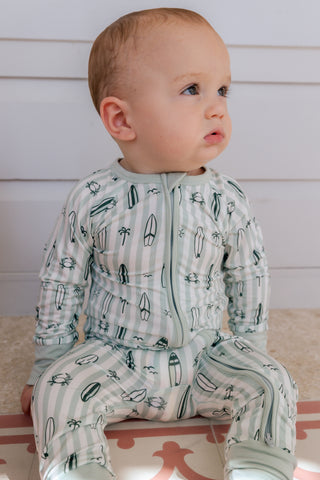 In My Jammers green zipper romper pajamas with surf-themed design, featuring a front zipper and comfortable fit.