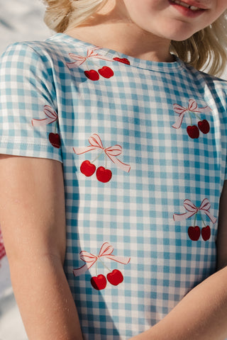 In My Jammers Little Cherry two-piece pajamas set with cherry print, featuring a top and matching pants for kids.