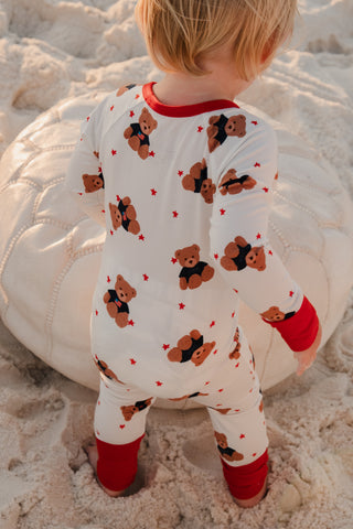 In My Jammers Star Spangled Teddy zipper romper pajamas featuring a patriotic star pattern and front zipper closure.