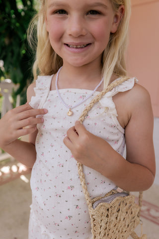 Cream In My Jammers Pointelle Tank Short Set featuring a sleeveless tank top and matching shorts, styled for casual comfort.