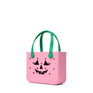 Bitty Bogg® Bag - Pink Bogg O Lantern
Pink Halloween-themed bucket bag with green handles on a white background