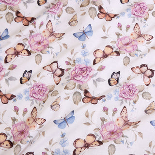 Posh Peanut Ruffle Twirl Dress - Mariselle
Floral and butterfly pattern on a white background